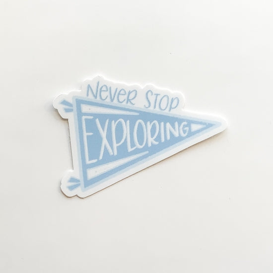 Never Stop Exploring Pennant Sticker